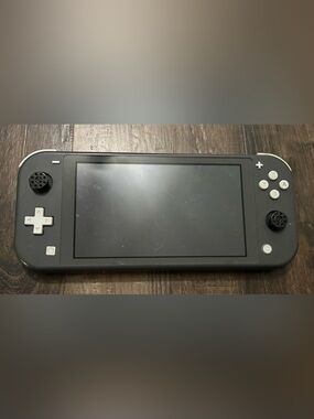 Gray Switch Lite Handheld Gaming System- worked but then battery won’t charge